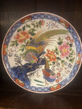 ceramic plate with bird and flowers decor