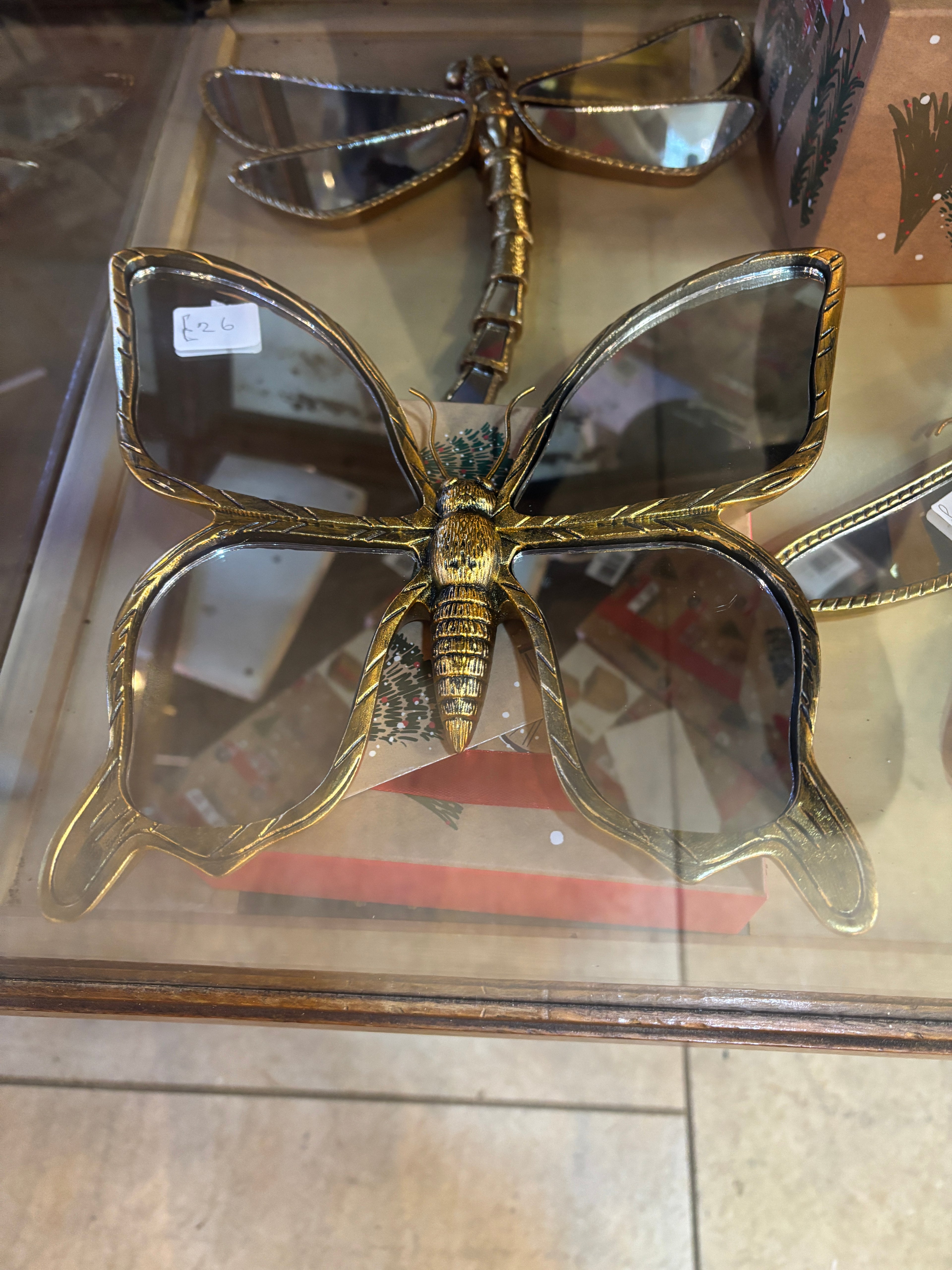 butterfly mirror with gold body and frame