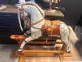 Rocking horse with grey hair and dappled coat